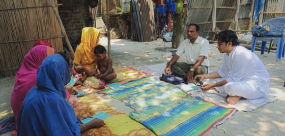 Community discussion in a village courtyard
